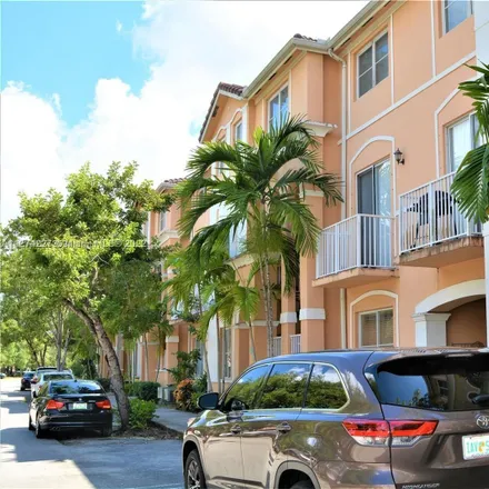 Rent this 2 bed condo on 7493 Northwest 177th Terrace in Palm Springs North, Hialeah