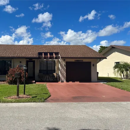 Buy this 3 bed house on 1587 Southwest 20th Way in Deerfield Beach, FL 33442