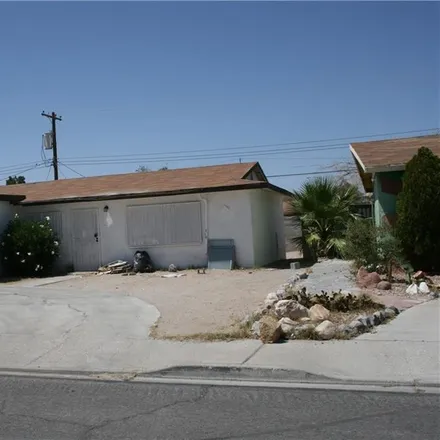 Buy this 4 bed house on 1932 Lawry Avenue in North Las Vegas, NV 89032