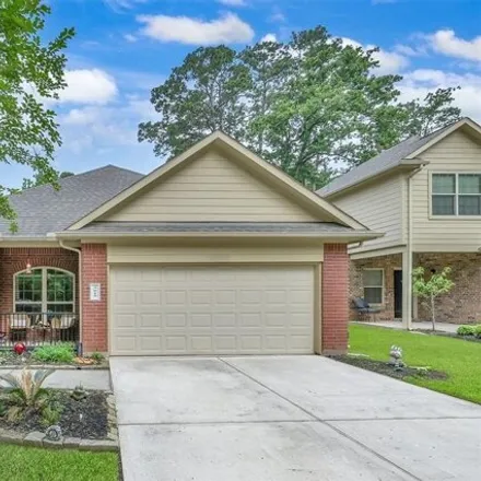 Buy this 3 bed house on 3633 Spyglass Hill Drive in Montgomery County, TX 77356