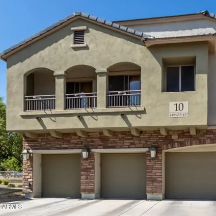 Rent this 3 bed townhouse on 453 North 169th Avenue in Goodyear, AZ 85338