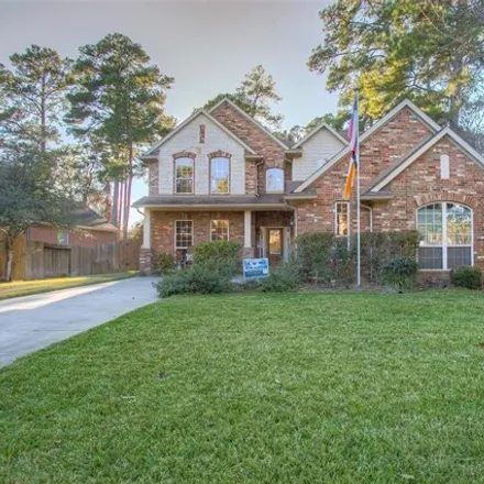 Buy this 4 bed house on 2502 Greystone Hills Drive in Conroe, TX 77304