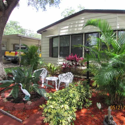 Buy this 2 bed house on 10907 Whispering Oaks Circle in Riverview, FL 33569