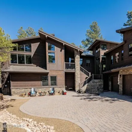 Buy this 4 bed house on 3040 South Solitaries Canyon Drive in Flagstaff, AZ 86005