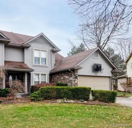 Rent this 4 bed house on 404 Mayapple Ct in Rochester Hills, Michigan