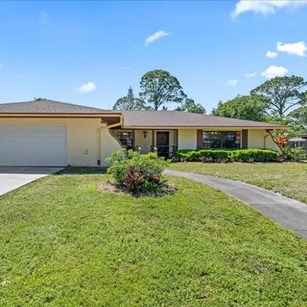 Buy this 4 bed house on 2636 Manorwood Drive in Melbourne, FL 32901