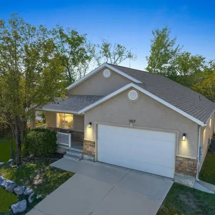 Buy this 4 bed house on 1409 Duck Pond Lane in Taylorsville, UT 84123