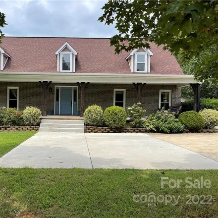 Buy this 4 bed house on 2896 Charlotte Highway in Mooresville, NC 28117