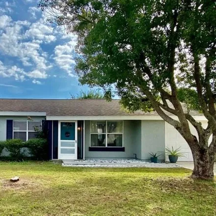 Rent this 3 bed house on 1243 Bard Lane Northeast in Palm Bay, FL 32905