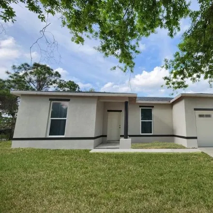 Buy this 3 bed house on 501 Andrew Street Southeast in Palm Bay, FL 32909