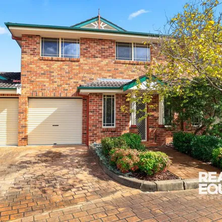 Rent this 3 bed townhouse on Ascot Drive in Chipping Norton NSW 2170, Australia