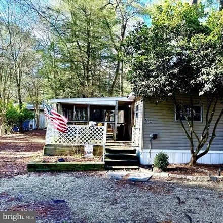 Buy this studio apartment on 27261 Cottage Road in Sussex County, DE 19966