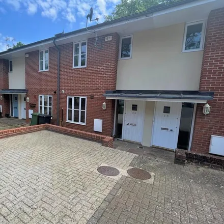 Rent this 2 bed townhouse on Grange Close in Winchester, SO23 9RS