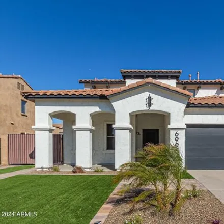 Buy this 5 bed house on 6995 South Stadium Court in Gilbert, AZ 85298