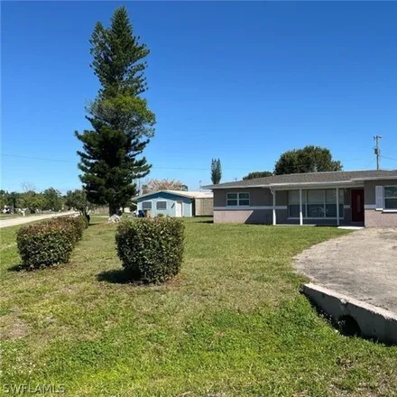 Rent this 3 bed house on 118 Georgia Rd in Lehigh Acres, Florida