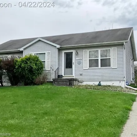 Buy this 3 bed house on 1227 River Oaks Drive in Flint Charter Township, MI 48532