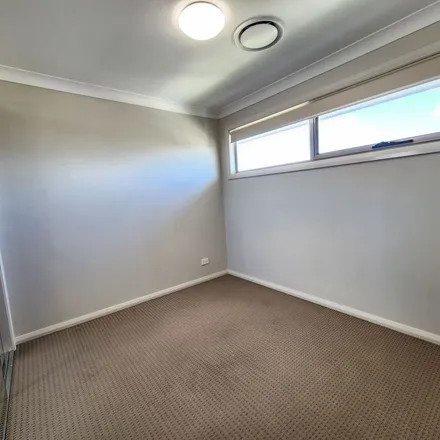 Rent this 4 bed apartment on Gledswood Hills Drive in Gledswood Hills NSW 2557, Australia