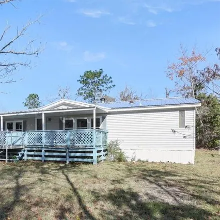 Buy this studio apartment on Northeast 24th Loop in Gilchrist County, FL 32643