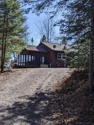 Buy this 3 bed house on 8441 Blue Heron Road in Presque Isle, WI 54557