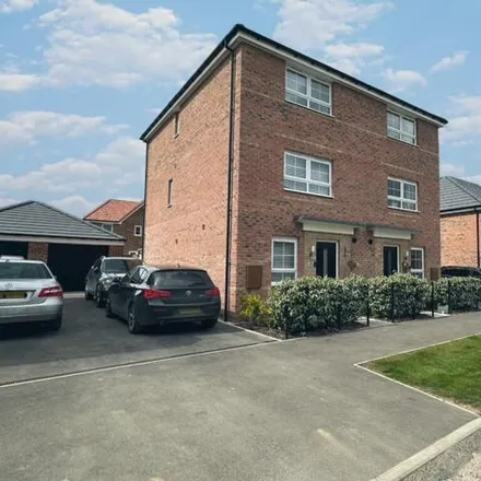 Buy this 4 bed townhouse on Park Farm in Len Pick Way, Bourne