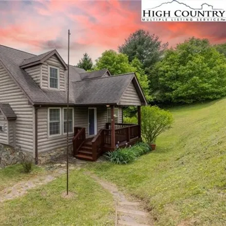 Buy this 4 bed house on 323 Meriwinds Hillside Farms Road in Ashe County, NC 28626