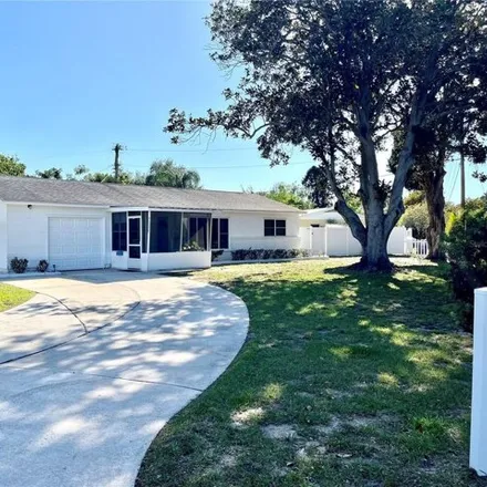 Rent this 3 bed house on 1420 76th Avenue North in Saint Petersburg, FL 33702