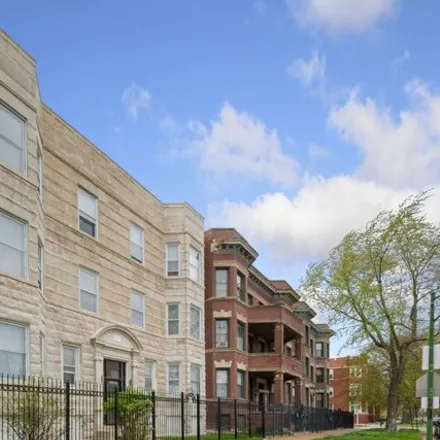 Rent this 3 bed apartment on 6110-6112 South Ingleside Avenue in Chicago, IL 60637