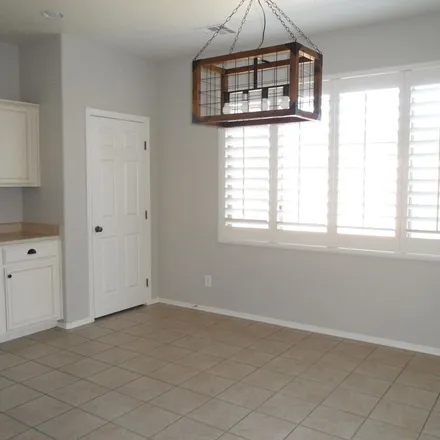 Rent this 4 bed apartment on 18690 East Ryan Road in Queen Creek, AZ 85142