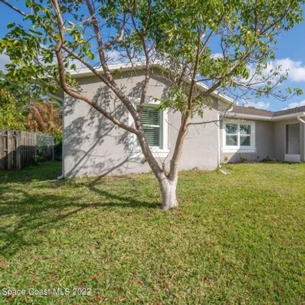 Rent this 3 bed house on 975 Spring Street Northwest in Palm Bay, FL 32907