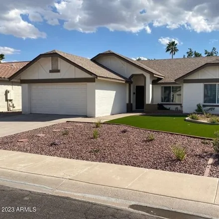 Rent this 4 bed house on 1027 East Hearne Way in Gilbert, AZ 85234