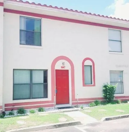Buy this 2 bed townhouse on 1760 Silver Creek Court in Orlando, FL 32807