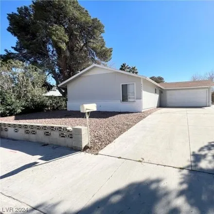 Buy this 4 bed house on 6273 Woodbury Avenue in Spring Valley, NV 89103