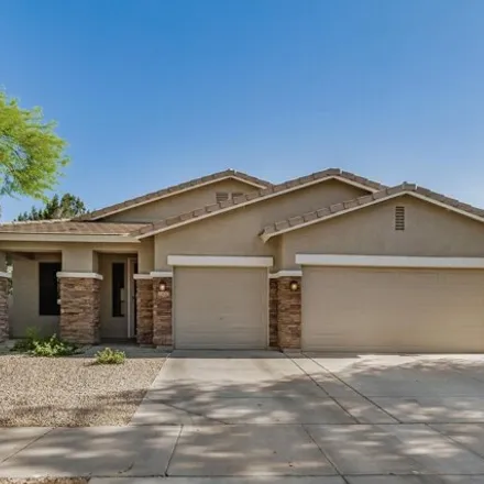 Rent this 4 bed house on 14205 West Desert Hills Drive in Surprise, AZ 85379