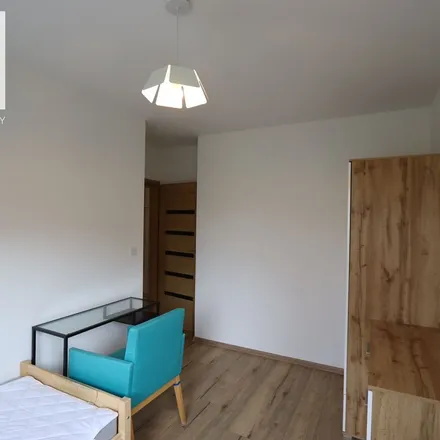 Rent this 4 bed apartment on Wincentego Oszustowskiego 5 in 30-243 Krakow, Poland