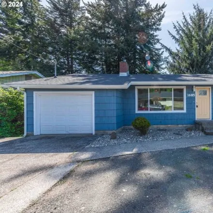 Buy this 4 bed house on 1685 Woodland Drive in Coos Bay, OR 97420