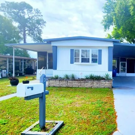 Buy this studio apartment on Palmetto Drive in Haines City, FL