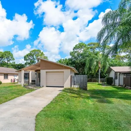 Buy this 3 bed house on 5337 Washington Road in County Club Acres, Palm Beach County
