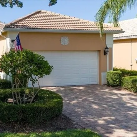 Buy this 3 bed house on 15476 Cortona Way in Naples, Florida