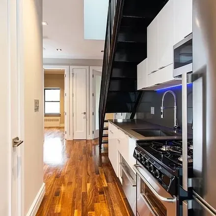 Rent this 4 bed apartment on 920 2nd Avenue in New York, NY 10017