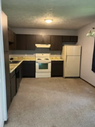 Rent this 2 bed apartment on 650 E 12TH ST