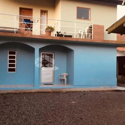 Buy this 9 bed house on Farmácia Ferrugem in Estrada Geral Praia da Ferrugem, Capão