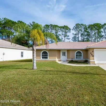 Rent this 3 bed house on 118 Point of Woods Drive in Palm Coast, FL 32164