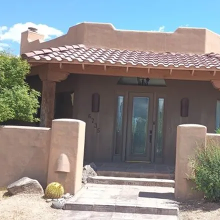 Buy this 4 bed house on 6735 East Dove Valley Road in Scottsdale, AZ 85327