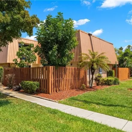 Buy this 2 bed townhouse on 1800 Park Meadows Drive in Villas, FL 33907