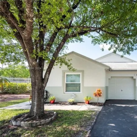 Buy this 3 bed house on 20762 Northwest 3rd Court in Pembroke Pines, FL 33029