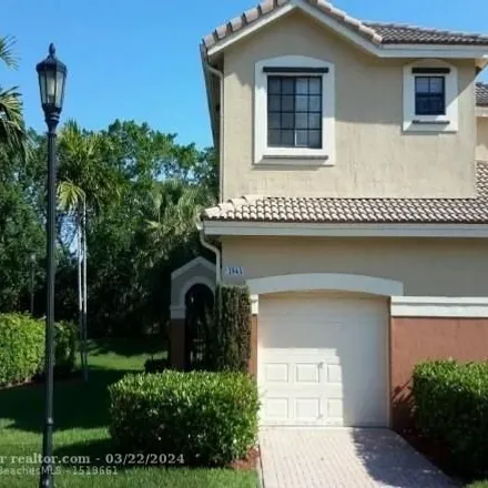 Rent this 4 bed townhouse on 3943 Tree Top Drive in Weston, FL 33332