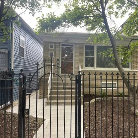 Buy this 3 bed house on 2930 North Dawson Avenue in Chicago, IL 60618