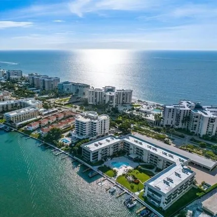 Buy this 2 bed condo on Coquina Club in Gulf Shore Boulevard North, Naples