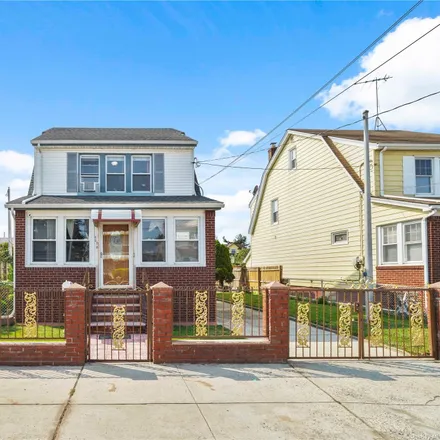 Buy this 4 bed house on 220-4 103rd Avenue in New York, NY 11429
