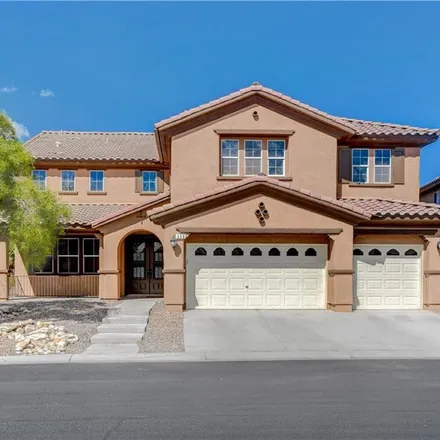 Rent this 4 bed loft on 698 Shirehampton Drive in Enterprise, NV 89178